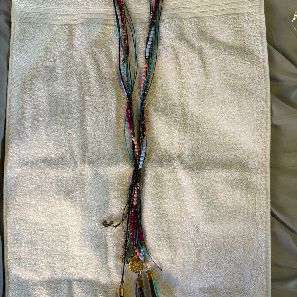 Lot of 5 necklaces and 1 pair of earrings. The large bead necklaces are heavy.